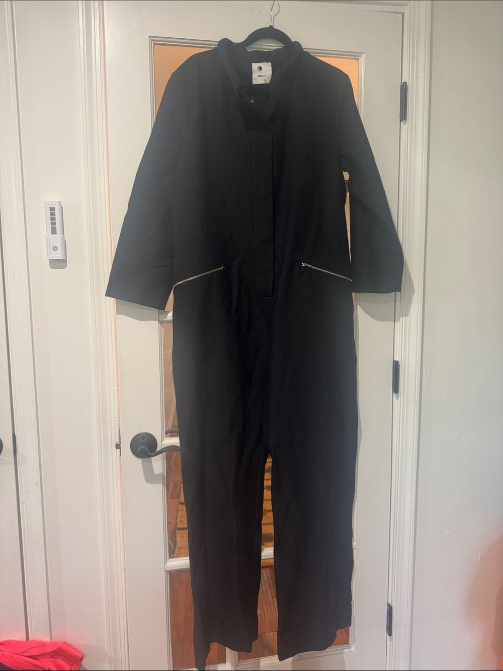 Nino brand Black Women's Long Sleeve Jumpsuit with Zip Pockets